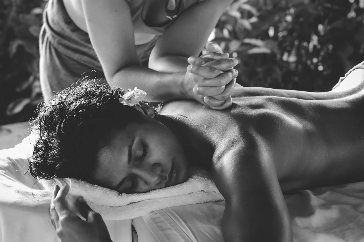 A person resting in a relaxed, restorative pose